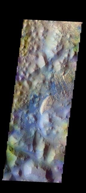 The THEMIS camera contains 5 filters. The data from different filters can be combined in multiple ways to create a false color image. These false color images may reveal subtle variations of the surface not easily identified in a single band image. Today's false color image shows part of Iani Chaos. The "dark blue" material is likely basaltic sand. Orbit Number: 18037 Latitude: -1.05225 Longitude: 341.26 Instrument: VIS Captured: 2006-01-07 10:45. http://photojournal.jpl.nasa.gov/catalog/PIA20228