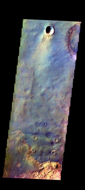 The THEMIS camera contains 5 filters. The data from different filters can be combined in multiple ways to create a false color image. These false color images may reveal subtle variations of the surface not easily identified in a single band image. Today's false color image shows part of the plains of Arabia Terra near the margin of Terra Meridiani. Orbit Number: 19458 Latitude: 1.40553 Longitude: 1.88038 Instrument: VIS Captured: 2006-05-04 12:35 http://photojournal.jpl.nasa.gov/catalog/PIA20231
