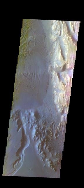 The THEMIS VIS camera contains 5 filters. The data from different filters can be combined in multiple ways to create a false color image. These false color images may reveal subtle variations of the surface not easily identified in a single band image. Today's false color image shows part of the floor of Gale Crater, home of the Curiosity Rover. The location of the rover is to the north of this image. The dark material on the upper left are dunes, the bright material on the upper right is part of the large central deposit of materials (the goal of the rover). The channel at the bottom of the image dissects the crater rim. Orbit Number: 19628 Latitude: -5.41839 Longitude: 137.086 Instrument: VIS Captured: 2006-05-18 12:33 http://photojournal.jpl.nasa.gov/catalog/PIA20245