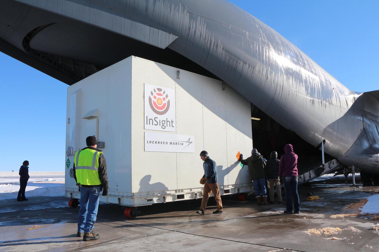Personnel supporting NASA's InSight mission to Mars load the crated InSight spacecraft into a C-17 cargo aircraft at Buckley Air Force Base, Denver, for shipment to Vandenberg Air Force Base, California. The spacecraft, built in Colorado by Lockheed Martin Space Systems, was shipped Dec. 16, 2015, in preparation for launch from Vandenberg in March 2016.  InSight, for Interior Exploration using Seismic Investigations, Geodesy and Heat Transport, is the first mission dedicated to studying the deep interior of Mars. Its findings will advance understanding of the early history of all rocky planets, including Earth.  Note: After thorough examination, NASA managers have decided to suspend the planned March 2016 launch of the Interior Exploration using Seismic Investigations Geodesy and Heat Transport (InSight) mission. The decision follows unsuccessful attempts to repair a leak in a section of the prime instrument in the science payload.  http://photojournal.jpl.nasa.gov/catalog/PIA20278
