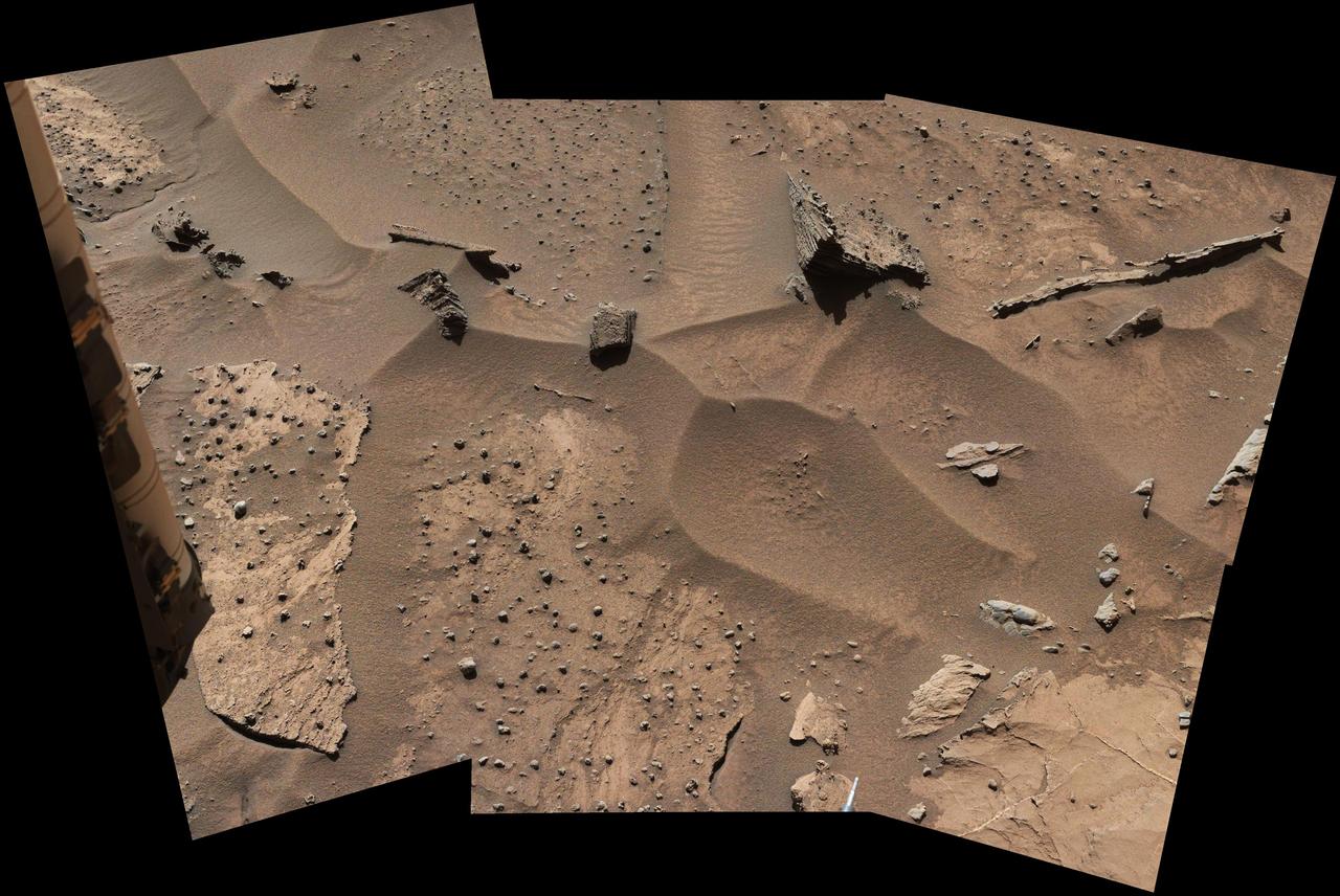 Patches of Martian sandstone visible in this view from NASA Curiosity Mars rover have a knobbly texture due to nodules apparently more resistant to erosion than the host rock in which some are still embedded.