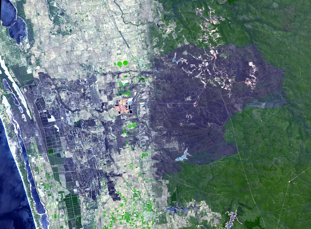 The summer, dry season in Australia is marked by small to massive bushfires. The remote town of Yarloop, about 75 miles (120 kilometers) south of the Western Australian capital of Perth, was destroyed as part of a 100,000-acre (405-square kilometer) blaze that started on January 7, 2016. The fire burned trees in the forested mountains, and extended down to the coast. This image, from the Advanced Spaceborne Thermal Emission and Reflection Radiometer (ASTER) instrument on NASA's Terra spacecraft, covers an area of 25 by 34 miles (40 by 54 kilometers). It was acquired Jan. 15, 2016, and is located at 32.9 degrees south, 115.9 degrees east. http://photojournal.jpl.nasa.gov/catalog/PIA20363