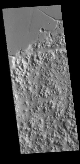 This image captured by NASA 2001 Mars Odyssey spacecraft shows a portion of Nilus Chaos. Located north of Kasei Vallis, this chaos formed at the elevation boundary between Kasei Valles and the surrounding plains.