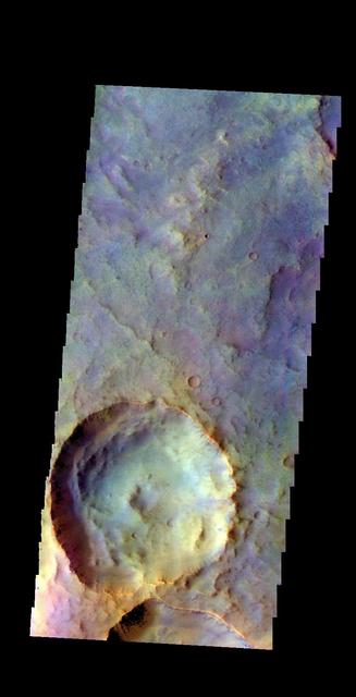 The THEMIS camera contains 5 filters. The data from different filters can be combined in multiple ways to create a false color image. This image from NASA 2001 Mars Odyssey spacecraft shows an unnamed crater in Terra Sabaea.
