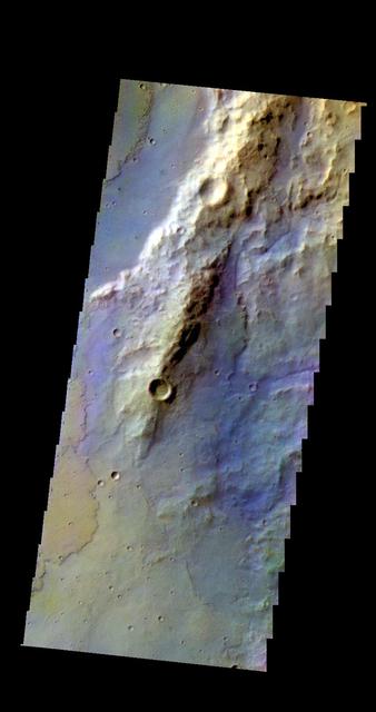 The THEMIS camera contains 5 filters. The data from different filters can be combined in multiple ways to create a false color image. This image from NASA 2001 Mars Odyssey spacecraft shows part of Terra Sirenum.