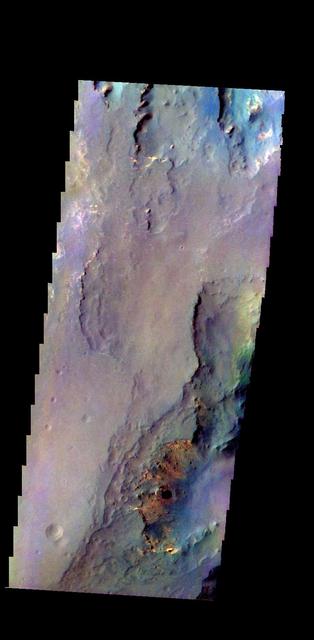 The THEMIS camera contains 5 filters. The data from different filters can be combined in multiple ways to create a false color image. This image from NASA 2001 Mars Odyssey spacecraft shows part of Capri Mensa.