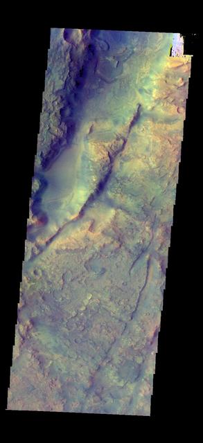 The THEMIS camera contains 5 filters. The data from different filters can be combined in multiple ways to create a false color image. This image from NASA 2001 Mars Odyssey spacecraft shows part of Nili Fossae.