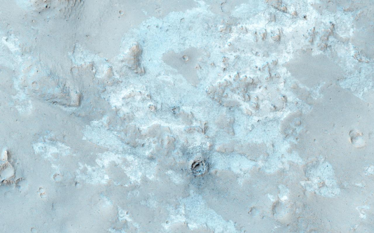 West of NASA Curiosity landing site, this image from NASA Mars Reconnaissance Orbiter spacecraft along the northwestern floor of Gale Crater is between Aeolis Mons informally called Mt. Sharp and the crater rim.