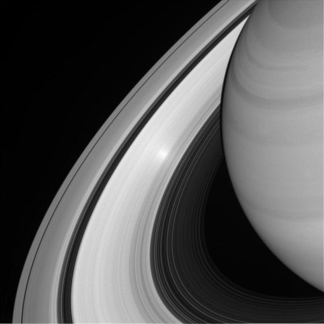 An ethereal, glowing spot appears on Saturn's B ring in this view from NASA's Cassini spacecraft. There is nothing particular about that place in the rings that produces the glowing effect -- instead, it is an example of an "opposition surge" making that area on the rings appear extra bright. An opposition surge occurs when the Sun is directly behind the observer looking toward the rings. The particular geometry of this observation makes the point in the rings appear much, much brighter than would otherwise be expected. This view looks toward the sunlit side of the rings from about 28 degrees above the ring plane. The image was taken in visible light with the Cassini wide-angle camera on June 26, 2016. The view was acquired at a distance of approximately 940,000 miles (1.5 million kilometers) from the rings and at a Sun-ring-spacecraft, or phase, angle of 0 degrees. Image scale on the rings at center is 56 miles (90 kilometers) per pixel. http://photojournal.jpl.nasa.gov/catalog/PIA20496