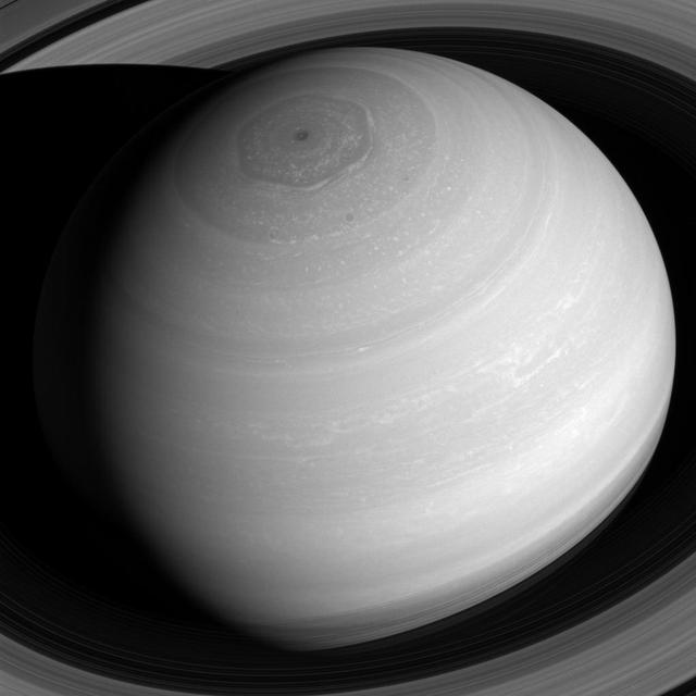 Saturn appears as a serene globe amid tranquil rings in this view from NASA's Cassini spacecraft. In reality, the planet's atmosphere is an ever-changing scene of high-speed winds and evolving weather patterns, punctuated by occasional large storms (see PIA14901). The rings, consist of countless icy particles, which are continually colliding. Such collisions play a key role in the rings' numerous waves and wakes, which are the manifestation of the subtle influence of Saturn's moons and, indeed, the planet itself.  The long duration of the Cassini mission has allowed scientists to study how the atmosphere and rings of Saturn change over time, providing much-needed insights into this active planetary system.  The view looks toward the sunlit side of the rings from about 41 degrees above the ring plane. The image was taken with the Cassini spacecraft wide-angle camera on July 16, 2016 using a spectral filter which preferentially admits wavelengths of near-infrared light centered at 752 nanometers.  The view was acquired at a distance of approximately 1 million miles (2 million kilometers) from Saturn. Image scale is 68 miles (110 kilometers) per pixel.  The view was obtained at a distance of approximately 752,000 miles (1.21 million kilometers) from Saturn and at a Sun-Saturn-spacecraft, or phase, angle of 6 degrees. Image scale is 45 miles (72 kilometers) per pixel.  http://photojournal.jpl.nasa.gov/catalog/PIA20502