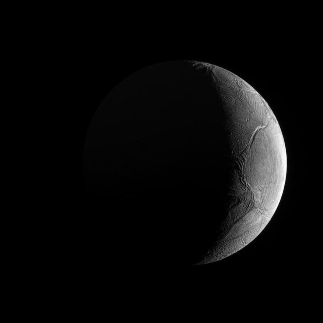 Seen from outside, Enceladus appears to be like most of its sibling moons: cold, icy and inhospitable. But under that forbidding exterior may exist the very conditions needed for life.  Over the course of the Cassini mission, observations have shown that Enceladus (313 miles or 504 kilometers across) not only has watery jets sending icy grains into space; under its icy crust it also has a global ocean, and may have hydrothermal activity as well. Since scientists believe liquid water is a key ingredient for life, the implications for future missions searching for life elsewhere in our solar system could be significant.  This view looks toward the Saturn-facing hemisphere of Enceladus. North on Enceladus is up and rotated 6 degrees to the right. The image was taken in green light with the Cassini spacecraft narrow-angle camera on Nov. 27, 2016.  The view was obtained at a distance of approximately 81,000 miles (130,000 kilometers) from Enceladus. Image scale is 2,566 feet (782 meters) per pixel.  http://photojournal.jpl.nasa.gov/catalog/PIA20522