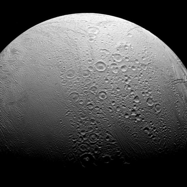 Enceladus is a world divided. To the north, we see copious amounts of craters and evidence of the many impacts the moon has suffered in its history. However, to the south we see a smoother body with wrinkles due to geologic activity. Most solar system bodies lacking an atmosphere are heavily cratered like Enceladus' (313 miles or 504 kilometers across) northern region. However, the geologic activity in the south, including the famous plume above the moon's south pole, can erase craters and leave a younger, smoother-looking surface. This view looks toward the anti-Saturn hemisphere of Enceladus. North on Enceladus is up and rotated 4 degrees to the right. The image was taken in visible light with the Cassini spacecraft narrow-angle camera on Nov. 27, 2016. The view was obtained at a distance of approximately 41,000 miles (66,000 kilometers) from Enceladus. Image scale is 1,310 feet (398 meters) per pixel. http://photojournal.jpl.nasa.gov/catalog/PIA20524