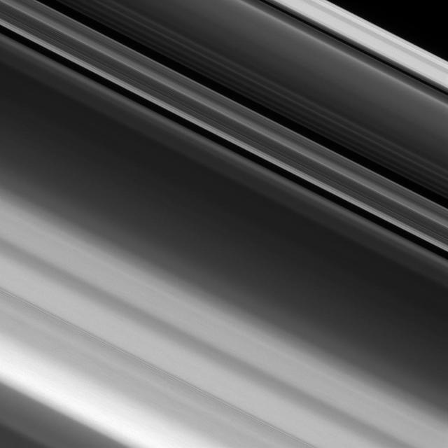 NASA's Cassini spacecraft zoomed in on Saturn's A ring, revealing narrow, detailed structures that get even finer as the cameras' resolution increases. Even at this level of detail, it is still not fine enough to resolve the individual particles that make up the ring. High-resolution images like this help scientists map the fine structure of Saturn's rings. Features less than a half a mile (one kilometer) in size are resolvable here. But the particles in the A ring typically range in size from several meters across down to centimeters, making them still far too small to see individually here. This view looks toward the sunlit side of the rings from about 38 degrees above the ring plane. The image was taken in visible light with the Cassini spacecraft narrow-angle camera on Jan. 9, 2017. The view was obtained at a distance of approximately 70,000 miles (113,000 kilometers) from Saturn and at a Sun-Saturn-spacecraft, or phase, angle of 11 degrees. Image scale is 2,300 feet (690 meters) per pixel. http://photojournal.jpl.nasa.gov/catalog/PIA20526