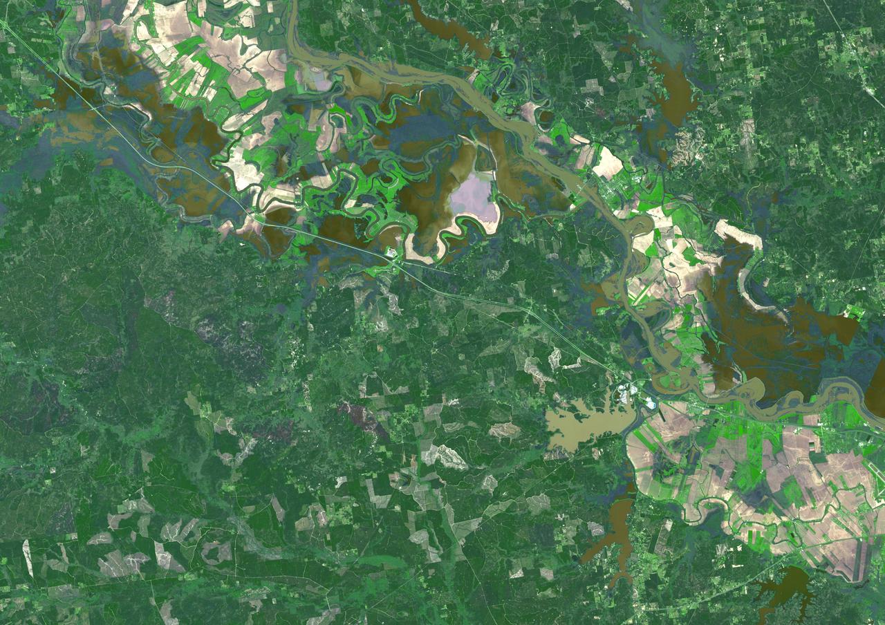 Torrential rains in the mid-South of the United States in mid-March 2016 produced flooding throughout Texas, Louisiana and Mississippi. On March 21, 2016, the Advanced Spaceborne Thermal Emission and Reflection Radiometer (ASTER) instrument on NASA's Terra spacecraft acquired this image showing persistent flooding along the Mississippi River between the Louisiana cities of Alexandria and Natchitoches. The image covers an area of 25 to 36 miles (41 by 58 kilometers), and is located at 31.5 degrees north, 92.8 degrees west.  http://photojournal.jpl.nasa.gov/catalog/PIA20533