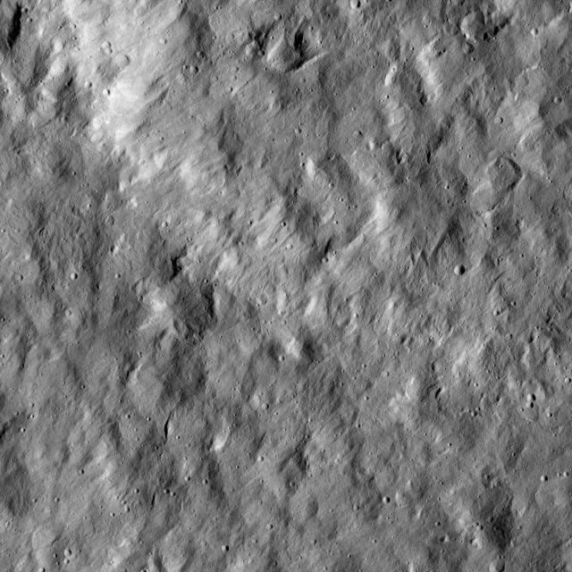 This view from NASA Dawn spacecraft shows a scene from the northern hemisphere of Ceres, north of Occator Crater, which is home of the brightest area on the dwarf planet.