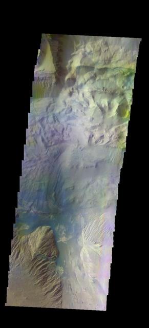 The THEMIS camera contains 5 filters. The data from different filters can be combined in multiple ways to create a false color image. This image from NASA 2001 Mars Odyssey spacecraft shows part of Ophir Chasma.