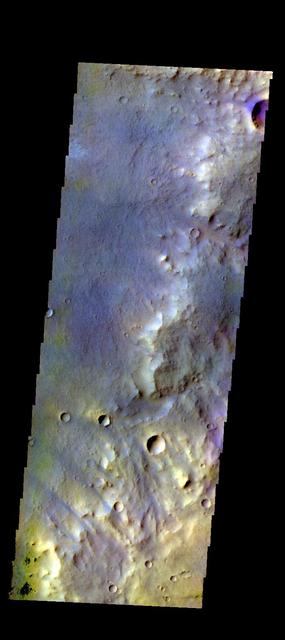 The THEMIS camera contains 5 filters. The data from different filters can be combined in multiple ways to create a false color image. This image from NASA 2001 Mars Odyssey spacecraft shows part of the plains of Arabia Terra.