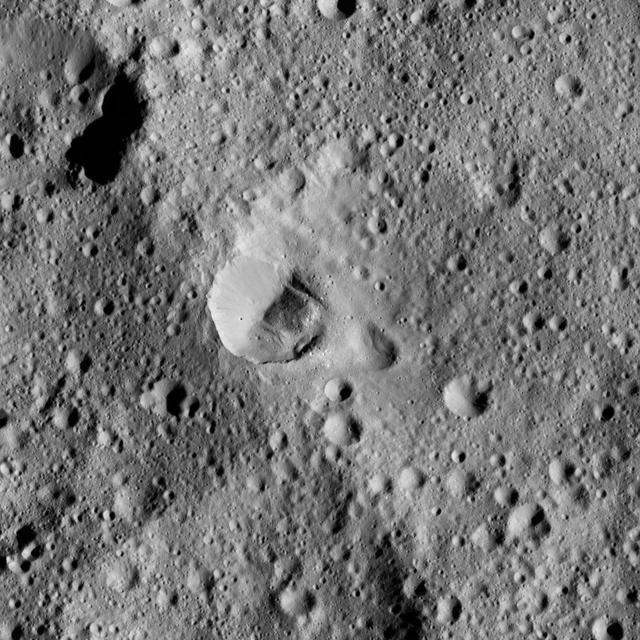 This Ceres scene captured by NASA Dawn spacecraft shows an ancient crater wall that has been disrupted, possibly by a landslide.