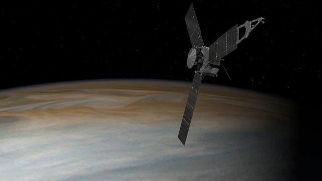 This illustration depicts NASA's Juno spacecraft in orbit above Jupiter. From its unique polar orbit, Juno will repeatedly dive between the planet and its intense belts of charged particle radiation. http://photojournal.jpl.nasa.gov/catalog/PIA20704