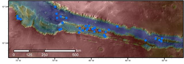 NASA image: Sites with Seasonal Streaks on Slopes in Mars Canyons