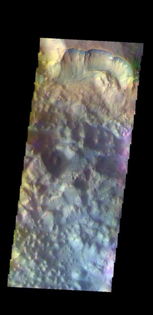 The THEMIS camera contains 5 filters. The data from different filters can be combined in multiple ways to create a false color image. These false color images may reveal subtle variations of the surface not easily identified in a single band image. Today's false color image shows Pyrrhae Chaos.  Orbit Number: 58875 Latitude: -10.0832 Longitude: 332.017 Instrument: VIS Captured: 2015-03-23 11:20  http://photojournal.jpl.nasa.gov/catalog/PIA20766