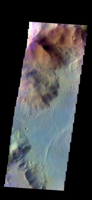 The THEMIS camera contains 5 filters.l The data from different filters can be combined in multiple ways to create a false color image. These false color images may reveal subtle variations of the surface not easily identified in a single band image. Today's false color images show part of Ausonia Montes. Orbit Number: 42503 Latitude: -28.1322 Longitude: 98.9668 Instrument: VIS Captured: 2011-07-14 23:09 http://photojournal.jpl.nasa.gov/catalog/PIA20794