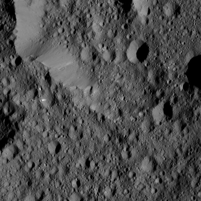 NASA Dawn spacecraft took this view from Ceres on June 16, 2016, showing Ernutet Crater 32 miles, 52 kilometers in diameter at top. NASA's Dawn spacecraft took this image on June 16, 2016, from its low-altitude mapping orbit, at a distance of about 240 miles (385 kilometers) above the surface. The image resolution is 120 feet (35 meters) per pixel. http://photojournal.jpl.nasa.gov/catalog/PIA20833