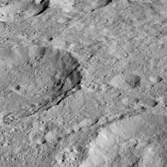 This oblique view from NASA's Dawn spacecraft shows Rao Crater (7 miles, 12 kilometers) at center left.  Dawn took this image on May 30, 2016, from its low-altitude mapping orbit, at a distance of about 240 miles (385 kilometers) above the surface. The image resolution is 120 feet (35 meters) per pixel.  http://photojournal.jpl.nasa.gov/catalog/PIA20868