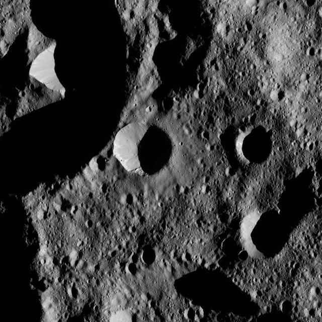 This view from NASA's Dawn spacecraft shows terrain in the northern hemisphere of Ceres, near Jarovit Crater.  Dawn took this image on June 2, 2016, from its low-altitude mapping orbit, at a distance of about 240 miles (385 kilometers) above the surface. The image resolution is 120 feet (35 meters) per pixel.  http://photojournal.jpl.nasa.gov/catalog/PIA20939