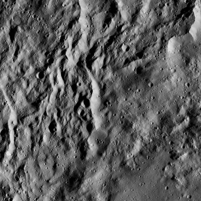 The interior of Urvara Crater (101 miles, 163 kilometers wide) is featured in this image from NASA's Dawn spacecraft.  Dawn took this image on June 2, 2016, from its low-altitude mapping orbit, at a distance of about 240 miles (385 kilometers) above the surface. The image resolution is 120 feet (35 meters) per pixel.  http://photojournal.jpl.nasa.gov/catalog/PIA20943
