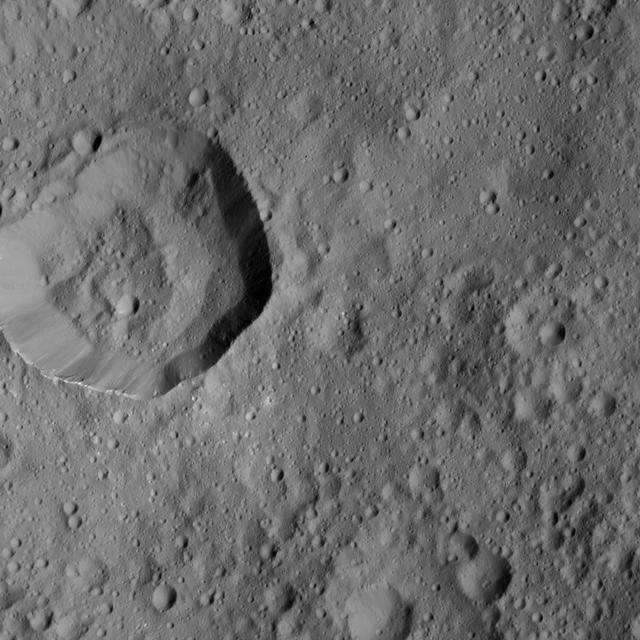 This image from NASA's Dawn spacecraft shows cratered terrain on Ceres. The image is centered at 23 degrees north latitude, 186 degrees east longitude.  Dawn took this image on June 10, 2016, from its low-altitude mapping orbit, at a distance of about 240 miles (385 kilometers) above the surface. The image resolution is 120 feet (35 meters) per pixel.  http://photojournal.jpl.nasa.gov/catalog/PIA20963