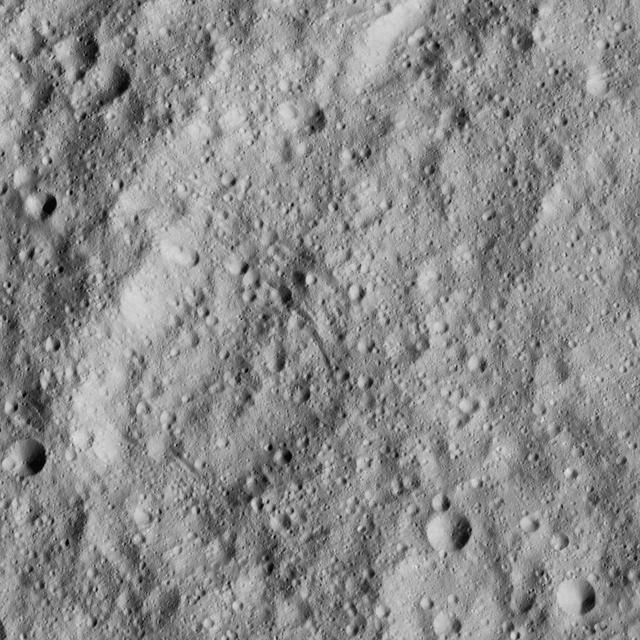 This image from NASA's Dawn spacecraft shows cratered terrain just south of the equator of Ceres. The image is centered at 17 degrees south latitude, 295 degrees east longitude.  Dawn took this image on June 15, 2016, from its low-altitude mapping orbit, at a distance of about 240 miles (385 kilometers) above the surface. The image resolution is 120 feet (35 meters) per pixel.  http://photojournal.jpl.nasa.gov/catalog/PIA20969