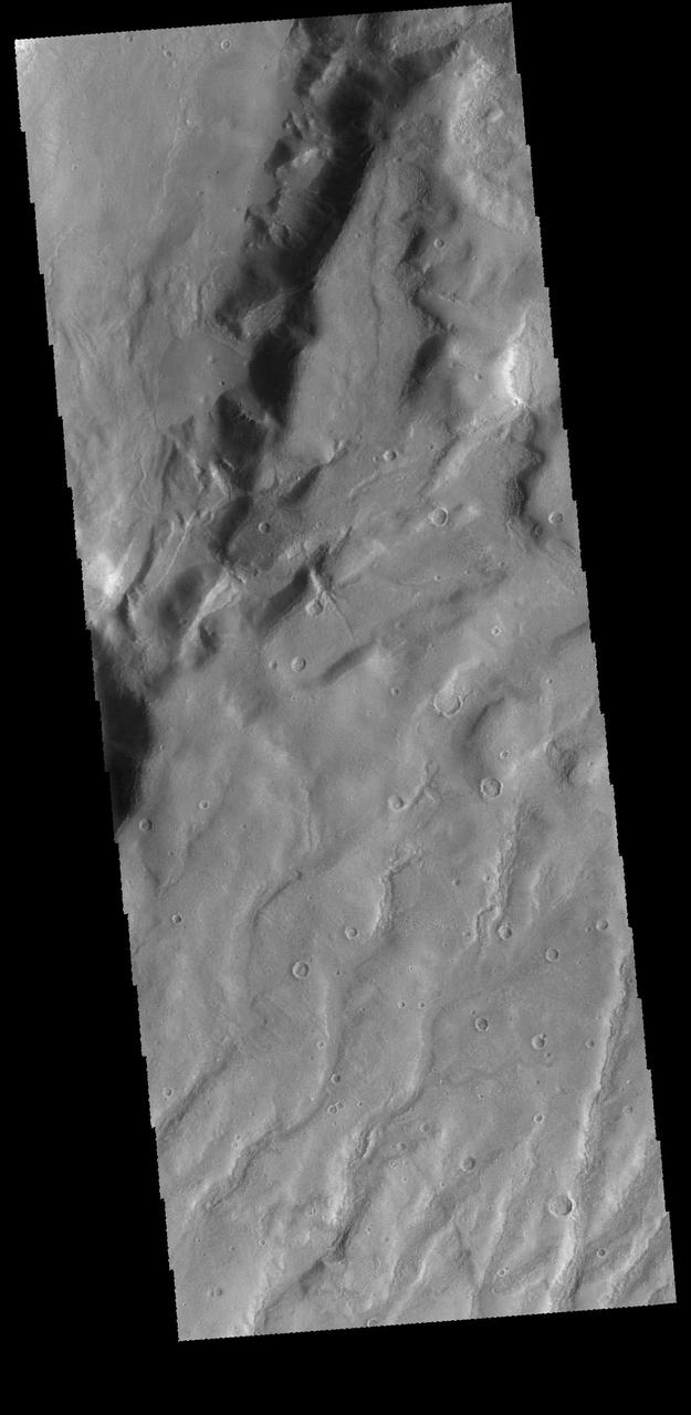 This VIS image shows several channels dissecting the higher elevations of Claritas Fossae. Orbit Number: 65209 Latitude: -40.6523 Longitude: 266 Instrument: VIS Captured: 2016-08-26 03:33 http://photojournal.jpl.nasa.gov/catalog/PIA21005