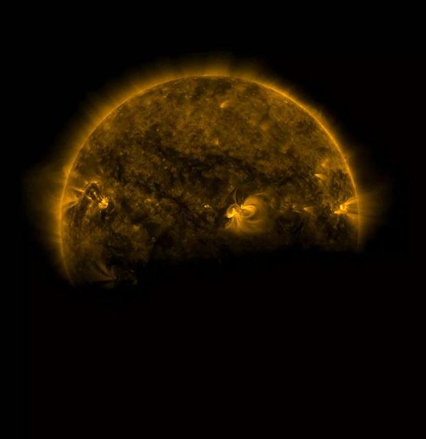 Several times a day for a few days this week the Earth completely blocked the Sun for about an hour due to SDO's orbital path (Aug. 25, 2016). The edge of the Earth is not crisp, but rather kind of fuzzy due to Earth's atmosphere. The entire video clip here shows the beginning of one such eclipse, covering just seven minutes. These occur about every six months. The Moon blocks SDO's view of the Sun on occasion as well. A movie is available at http://photojournal.jpl.nasa.gov/catalog/PIA21027
