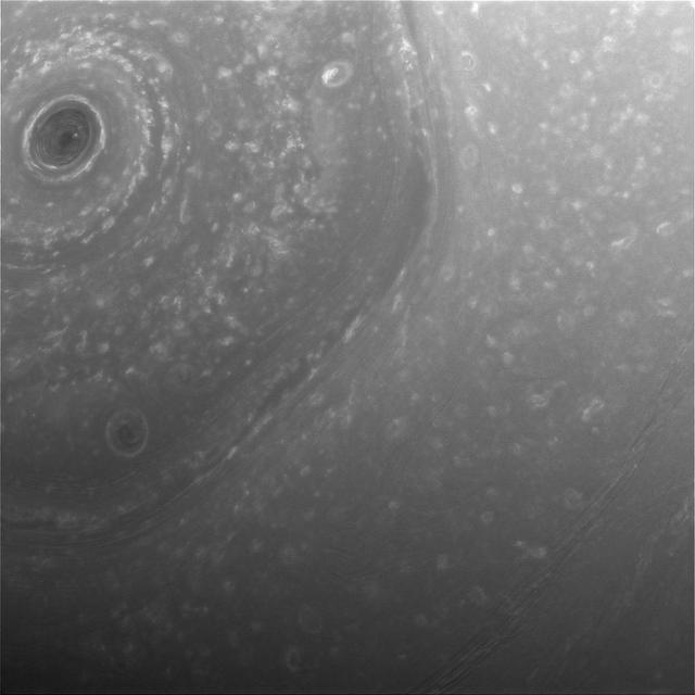 This view from NASA's Cassini spacecraft was obtained about half a day before its first close pass by the outer edges of Saturn's main rings during its penultimate mission phase. The view shows part of the giant, hexagon-shaped jet stream around the planet's north pole. Each side of the hexagon is about as wide as Earth. A circular storm lies at the center, at the pole (see PIA14944). The image was taken with the Cassini spacecraft wide-angle camera on Dec. 3, 2016, at a distance of about 240,000 miles (390,000 kilometers) from Saturn. Image scale is 14 miles (23 kilometers) per pixel. http://photojournal.jpl.nasa.gov/catalog/PIA21052