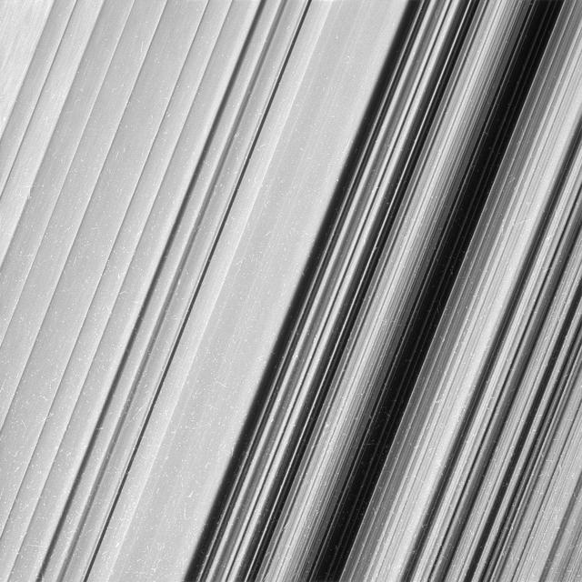This image shows a region in Saturn's outer B ring. NASA's Cassini spacecraft viewed this area at a level of detail twice as high as it had ever been observed before. And from this view, it is clear that there are still finer details to uncover. Researchers have yet to determine what generated the rich structure seen in this view, but they hope detailed images like this will help them unravel the mystery. In order to preserve the finest details, this image has not been processed to remove the many small bright blemishes, which are created by cosmic rays and charged particle radiation near the planet. The image was taken in visible light with the Cassini spacecraft wide-angle camera on Dec. 18, 2016. The view was obtained at a distance of approximately 32,000 miles (51,000 kilometers) from the rings, and looks toward the unilluminated side of the rings. Image scale is about a quarter-mile (360 meters) per pixel. http://photojournal.jpl.nasa.gov/catalog/PIA21058