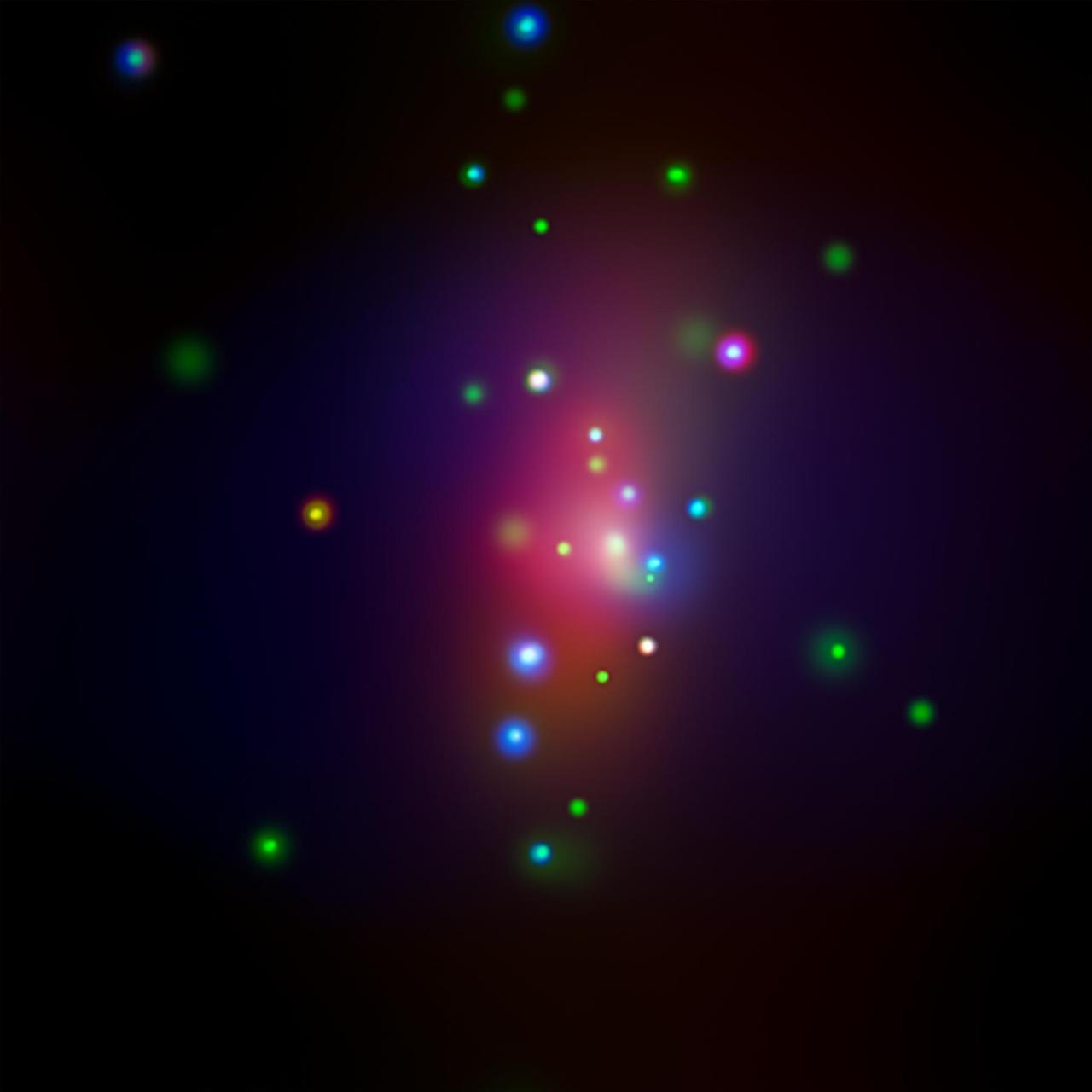 This image from NASA's Chandra X-ray Observatory shows spiral galaxy NGC 7331, center, in a three-color X-ray image. Red, green and blue colors are used for low, medium and high-energy X-rays, respectively. An unusual supernova called SN 2014C has been spotted in this galaxy.  http://photojournal.jpl.nasa.gov/catalog/PIA21089