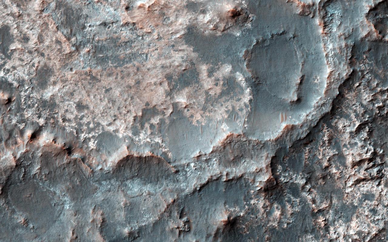 This image shows a transition from depressed to inverted channels in the Gorgonum Basin. In the darker terrain, there are two channels that display depressed topography. As these two channels cross into the underlying brighter terrain, the channels now stand above the surrounding area, indicating they are inverted in topography.  This change from depressed to inverted topography is the result of what is called "differential erosion." The channel may contain hardened sediments or have cements that make it more resistant to erosion relative to the darker terrain that once flowed through it. As a result, erosion has removed the less resistant upper darker terrain, leaving behind the more resistant channel standing above the underlying bright terrain.  http://photojournal.jpl.nasa.gov/catalog/PIA21103