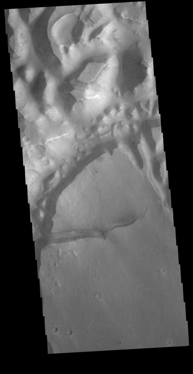 The region of hills and mesas at the top of this VIS image are part of Hydaspis Chaos.  Orbit Number: 65406 Latitude: 1.42739 Longitude: 334.12 Instrument: VIS Captured: 2016-09-11 09:15  http://photojournal.jpl.nasa.gov/catalog/PIA21156