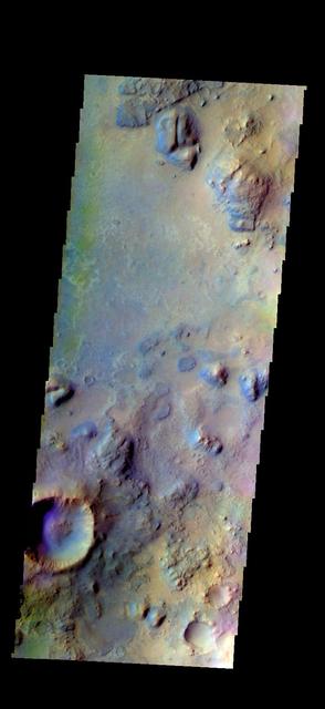 The THEMIS VIS camera contains 5 filters. The data from different filters can be combined in multiple ways to create a false color image. These false color images may reveal subtle variations of the surface not easily identified in a single band image. Today's false color image shows part Syrtis Major Planum. Orbit Number: 45811 Latitude: 21.5691 Longitude: 78.9549 Instrument: VIS Captured: 2012-04-12 07:43 http://photojournal.jpl.nasa.gov/catalog/PIA21171