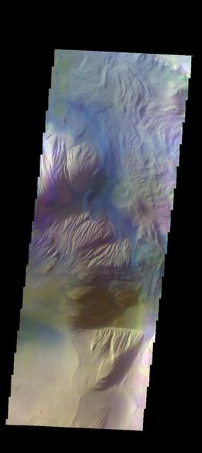 The THEMIS VIS camera contains 5 filters. The data from different filters can be combined in multiple ways to create a false color image. These false color images may reveal subtle variations of the surface not easily identified in a single band image. Today's false color image shows part of Ophir Chasma. Orbit Number: 45867 Latitude: -4.55075 Longitude: 289.252 Instrument: VIS Captured: 2012-04-16 20:31 http://photojournal.jpl.nasa.gov/catalog/PIA21173