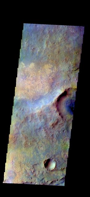 The THEMIS VIS camera contains 5 filters. The data from different filters can be combined in multiple ways to create a false color image. These false color images may reveal subtle variations of the surface not easily identified in a single band image. Today's false color image shows part of Syrtis Major Planum. Orbit Number: 45886 Latitude: 19.0521 Longitude: 75.685 Instrument: VIS Captured: 2012-04-18 11:54 http://photojournal.jpl.nasa.gov/catalog/PIA21174