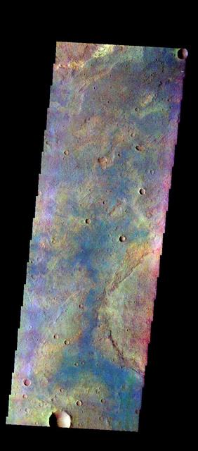 The THEMIS VIS camera contains 5 filters. The data from different filters can be combined in multiple ways to create a false color image. These false color images may reveal subtle variations of the surface not easily identified in a single band image. Today's false color image shows part of the plains of Terra Sabaea. Orbit Number: 49034 Latitude: -25.4878 Longitude: 44.1368 Instrument: VIS Captured: 2013-01-02 12:26 http://photojournal.jpl.nasa.gov/catalog/PIA21200