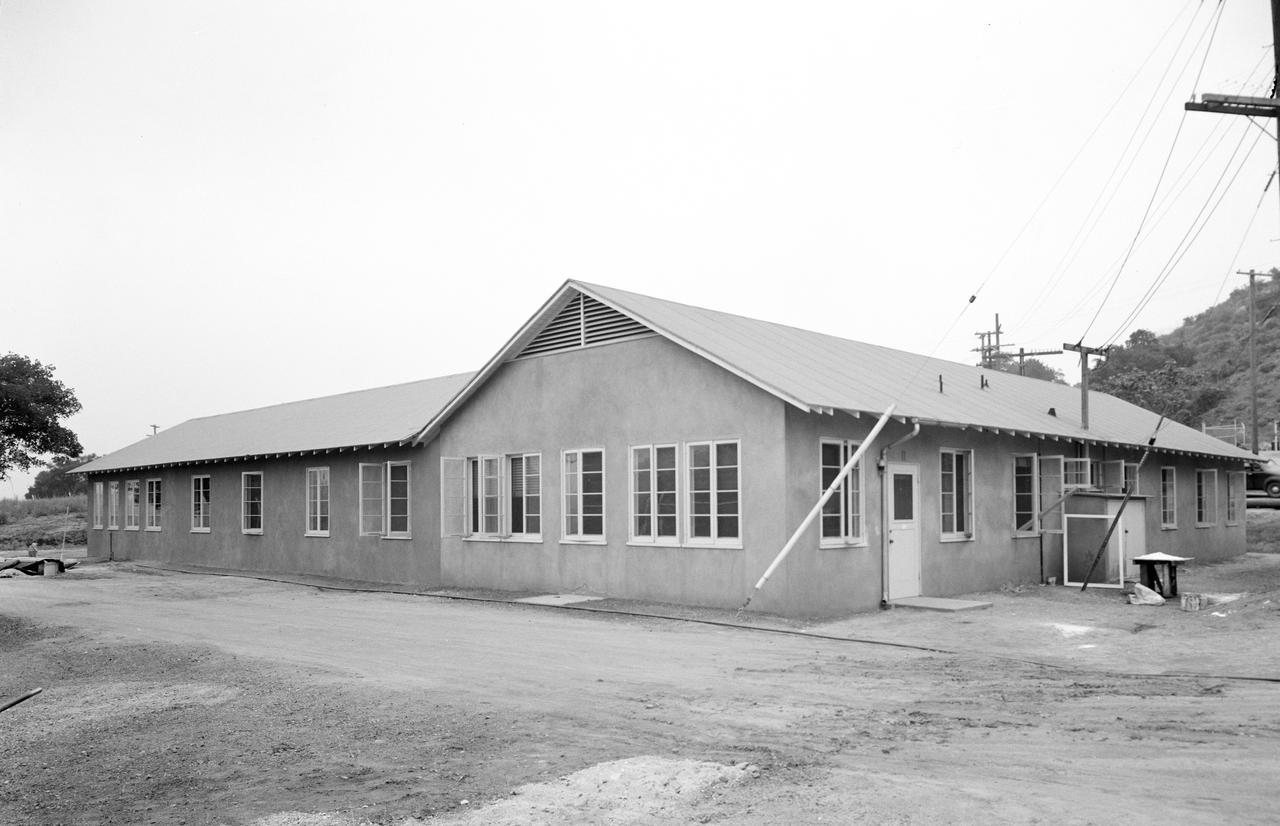 This archival image was released as part of a gallery comparing JPL's past and present, commemorating the 80th anniversary of NASA's Jet Propulsion Laboratory on Oct. 31, 2016.  Building 11, one of the oldest buildings on lab, was once JPL's central administration building. It is now the Space Sciences Laboratory. This picture dates back to May 1943.  http://photojournal.jpl.nasa.gov/catalog/PIA21201