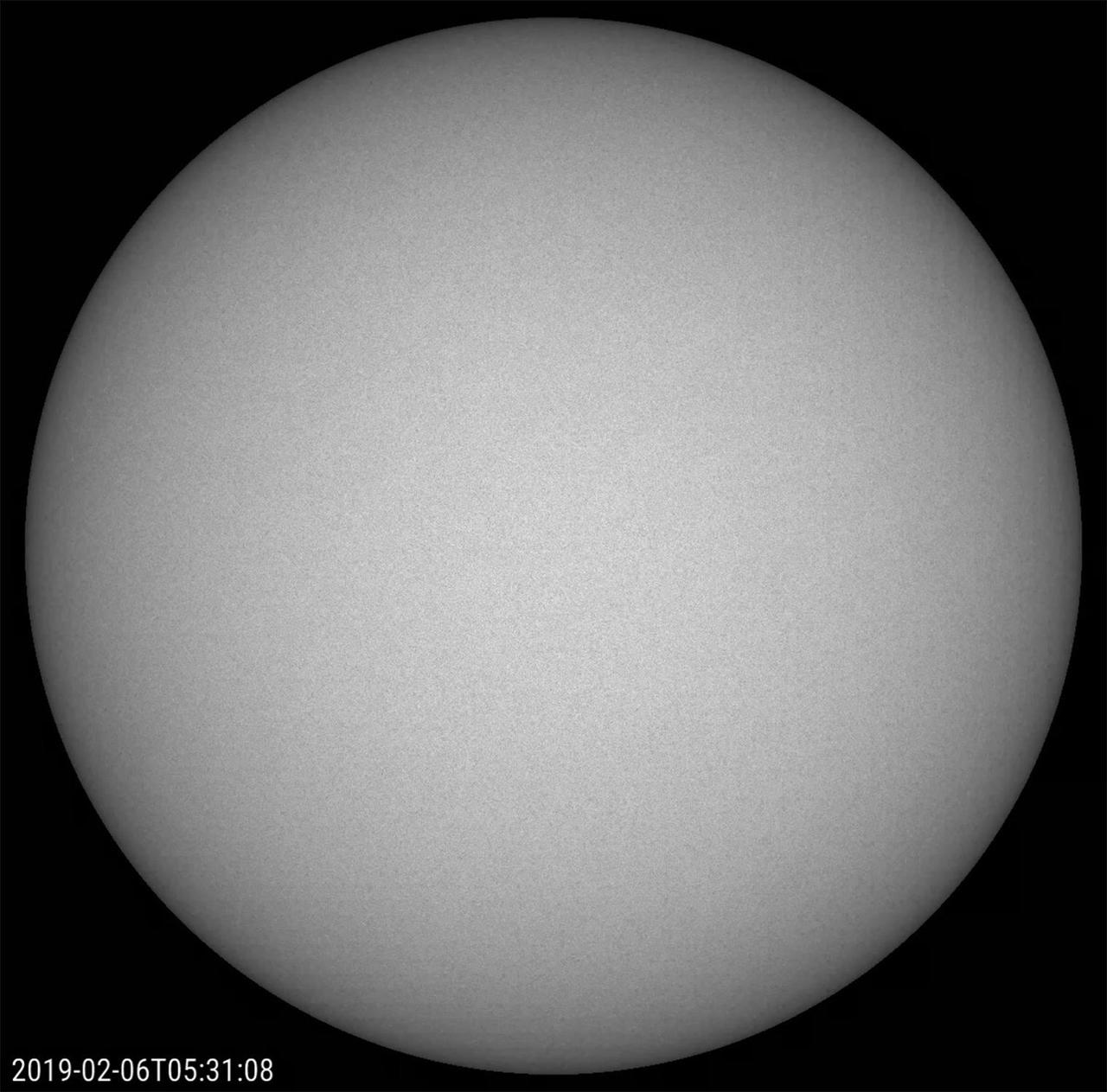For the first time in a long time the Sun has gone an entire month without any sunspots (Feb. 1-18, 2019). To put this in context, for five years (2011-2015) surrounding the latest solar maximum in March 2014 - the period when the Sun's magnetic activity is the most intense - there were only three days without any sunspots[MH1]. What a difference! The change in the level of activity during the Sun's average 11-year solar cycle is quite dramatic. We are probably not quite at the minimum level of activity yet, but are certainly getting close. The images were taken in filtered white (visible) light.  Movies available at https://photojournal.jpl.nasa.gov/catalog/PIA21218