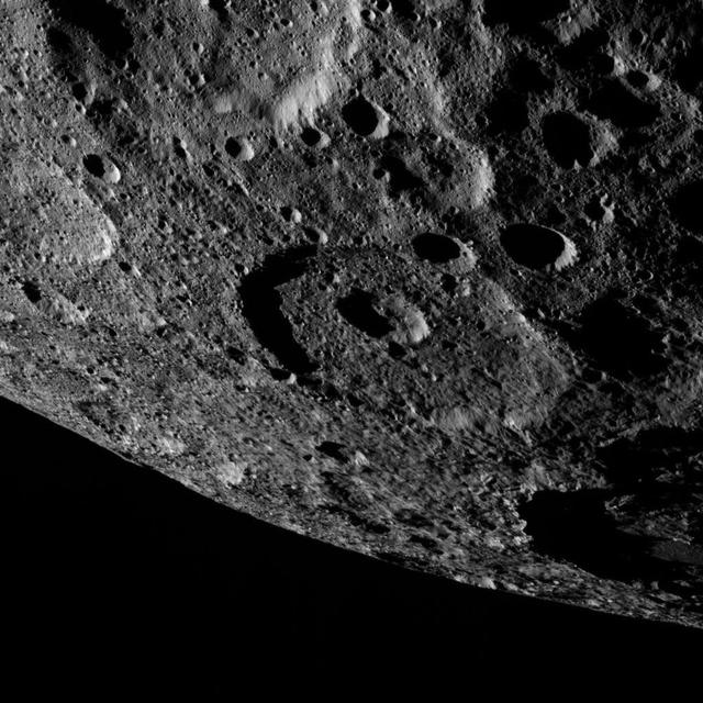 This image of the limb of dwarf planet Ceres shows a section of the northern hemisphere. A shadowy portion of Occator Crater can be seen at the lower right -- its bright "spot" areas are outside of the frame of view. Part of Kaikara Crater (45 miles, 72 kilometers in diameter) is visible at top left.  Dawn took this image on Oct. 17 from its second extended-mission science orbit (XMO2), at a distance of about 920 miles (1,480 kilometers) above the surface. The image resolution is about 460 feet (140 meters) per pixel.  http://photojournal.jpl.nasa.gov/catalog/PIA21230