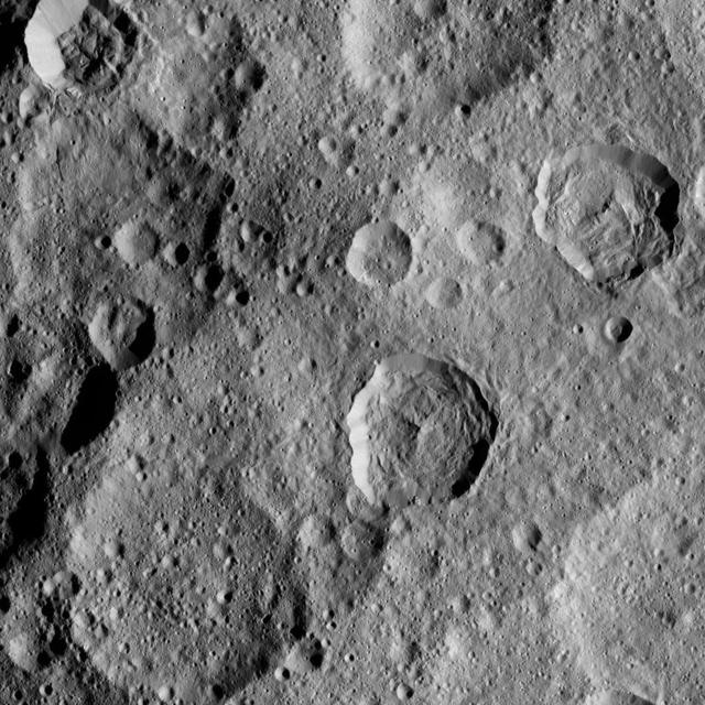 This image shows a portion of the northern hemisphere of Ceres, as seen by NASA's Dawn spacecraft. Cozobi Crater is the sharply defined impact feature at top left. At far right is Victa Crater. Abellio Crater is the sharply defined crater with a central peak just below center. Dawn took this image on Oct. 18 from its second extended-mission science orbit (XMO2), at a distance of about 920 miles (1,480 kilometers) above the surface. The image resolution is about 460 feet (140 meters) per pixel. http://photojournal.jpl.nasa.gov/catalog/PIA21231
