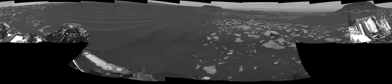 The left side of this 360-degree panorama from NASA's Curiosity Mars rover shows the long rows of ripples on a linear shaped dune in the Bagnold Dune Field on the northwestern flank of Mount Sharp.  The view is a mosaic of images taken with Curiosity's Navigation Camera (Navcam) on Feb. 5, 2017, during the 1,601st Martian day, or sol, of the rover's work on Mars. The view is centered toward west-southwest, with east-southeast on either end. A capped mound called "Ireson Hill" is on the right.  http://photojournal.jpl.nasa.gov/catalog/PIA21268