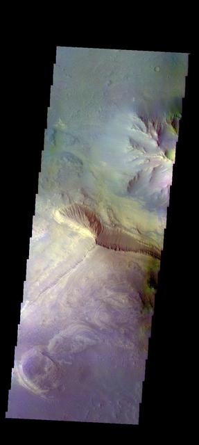 The THEMIS camera contains 5 filters. The data from different filters can be combined in multiple ways to create a false color image. This image from NASA 2001 Mars Odyssey spacecraft shows part of the interior of Coprates Chasma. Orbit Number: 50911 Latitude: -12.184 Longitude: 291.09 Instrument: VIS Captured: 2013-06-05 23:33 http://photojournal.jpl.nasa.gov/catalog/PIA21290