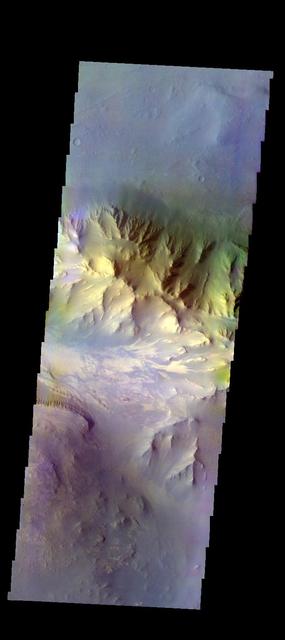 The THEMIS VIS camera contains 5 filters. The data from different filters can be combined in multiple ways to create a false color image. These false color images may reveal subtle variations of the surface not easily identified in a single band image. Today's false color image shows part of Coprates Chasma. Orbit Number: 51423 Latitude: -12.1253 Longitude: 291.311 Instrument: VIS Captured: 2013-07-18 02:40 http://photojournal.jpl.nasa.gov/catalog/PIA21308